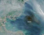 Satellite image of smoke produced by massive explosions in Tianjin (Image: NASA)